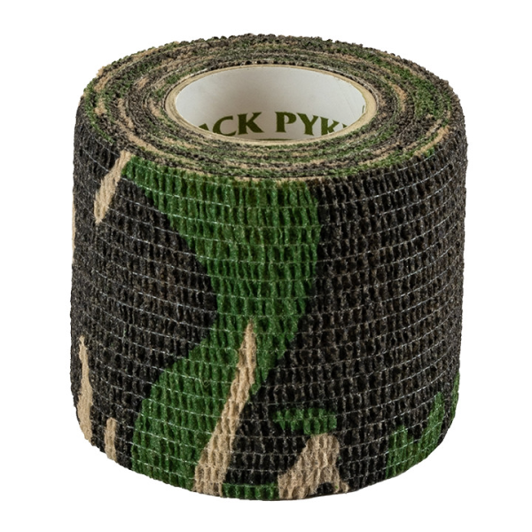 Camouflage tape with printed design on wooden spool.